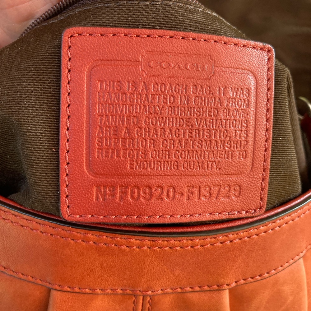 Coach SoHo, Burnt Orange Leather Shoulder Bag EUC, picture 8 shows a tiny dot - Picture 9 of 13